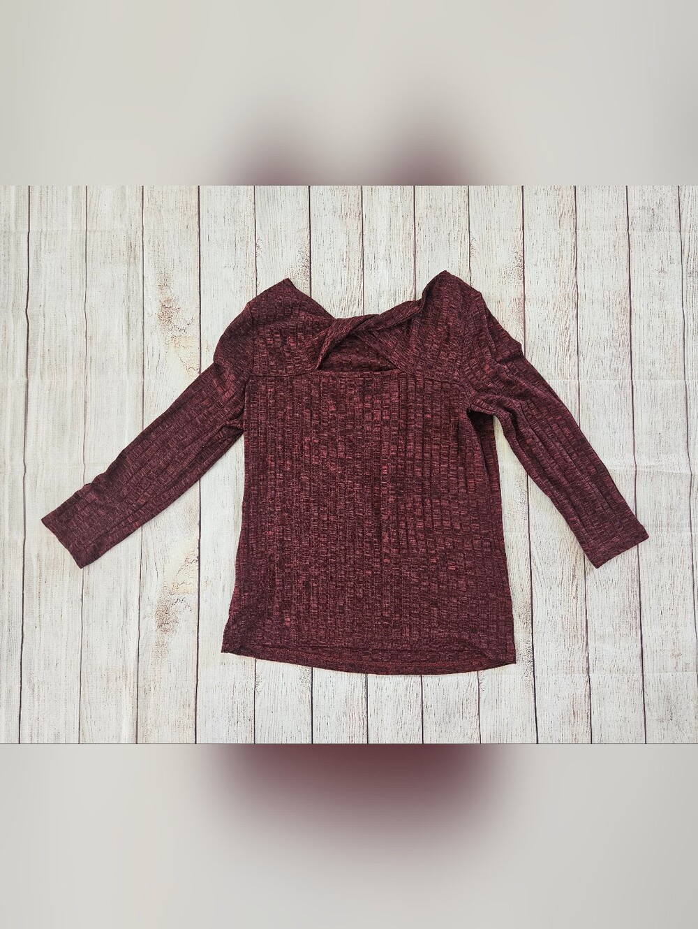 Nine West maroon top featuring a twisted open keyhole back detail